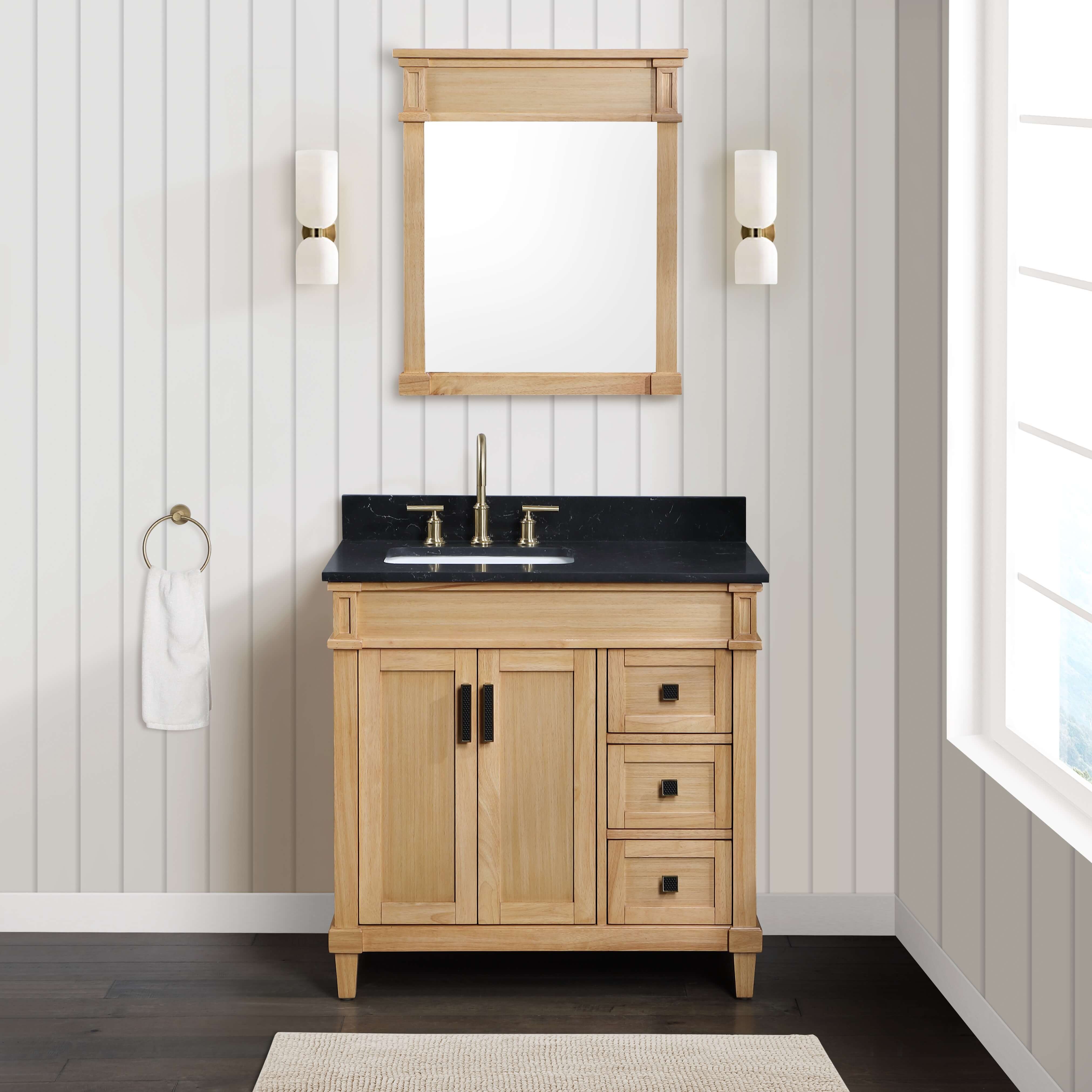 Black quartz and natural wood make a 36-inch vanity feel like a luxury piece.